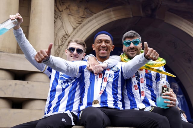 Sheffield Wednesday's George Byers, Liam Palmer and Callum Paterson celebrate their promotion to the Sky Bet Championship at Sheffield Town Hall following an open top bus parade. Picture Richard Sellers/PA Wire.