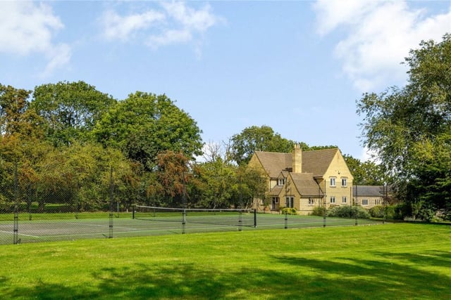 This substantial, modern property is nestled amid open countryside near Haddon within almost 52 acres of land, complete with stables, a tennis court, swimming pool complex and a helipad. Price: £2,250,000.