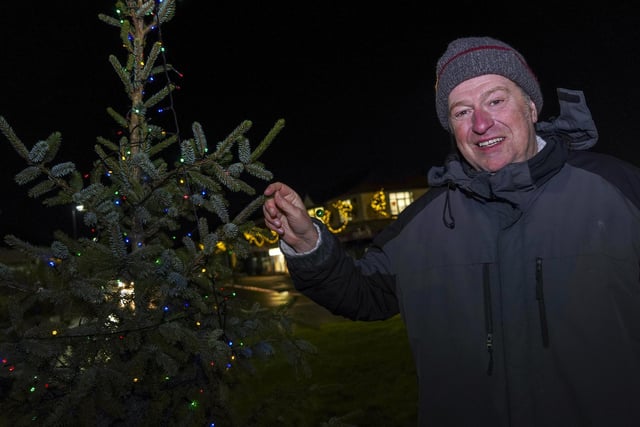 Organiser Kevin Palmer with some of the Christmas decorations in Greenhill. Picture Scott Merrylees