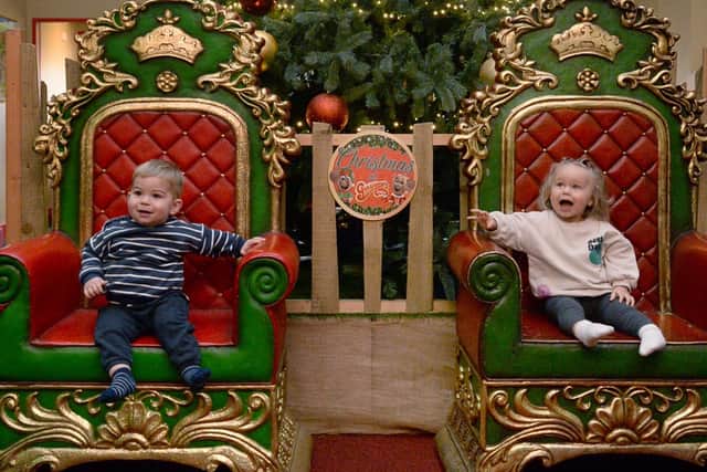 Young visitors pose for a festive photo during their visit to Christmas at Gulliver's Valley - photo by Kerrie Beddows