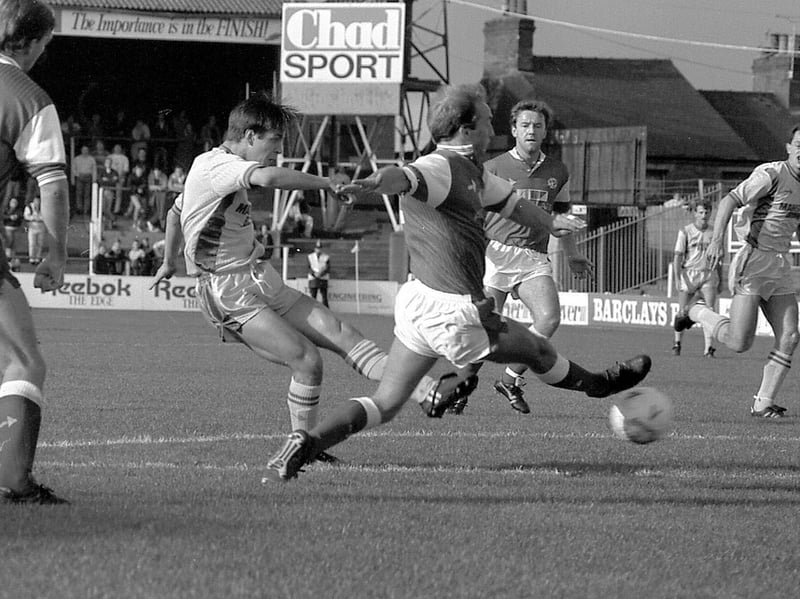 Ian Stringfellow of Mansfield Town gets a shot away as Walsall defend during their 2-0 home victory in October 1989. The result gave Walsall supporters plenty to smile about as they saw their side claim a convincing win. Do you remember this match, or any of the Walsall players who took to the pitch that day?