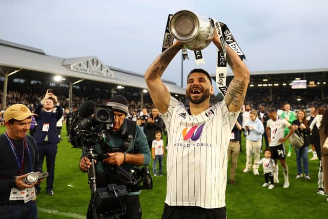 Aleksandar Mitrovic of Fulham lifts the Sky Bet Championship trophy and faces Sheffield United on Saturday: Clive Rose/Getty Images