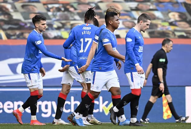 Rangers' Ianis Hagi (left) celebrates his opener during a Scottish Premiership match between Rangers and Dundee United at Ibrox on February 21, 2021, in Glasgow, Scotland (Photo by Rob Casey / SNS Group)