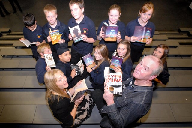 Author David Almond paid a visit to Mortimer Community College in 2012 and he is pictured with teacher Pauline Martin and her Year 8 pupils.