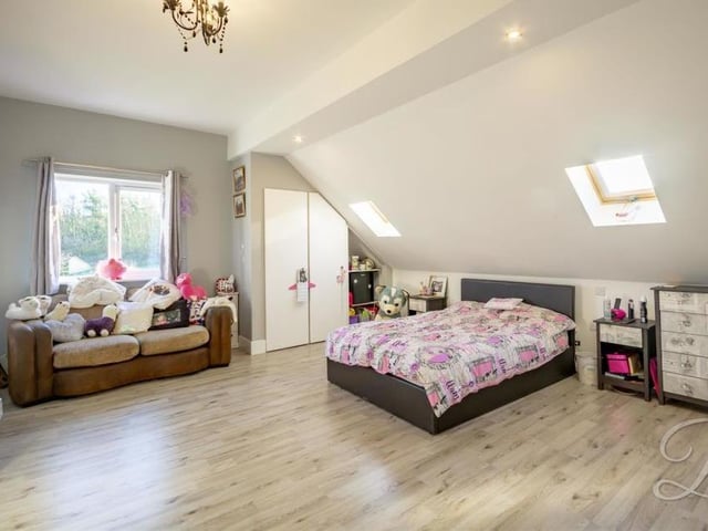 The second bedroom is so large that it has to be admired for its versatility. With laminate flooring, it boasts two Velux windows to the rear, a central-heating radiator and uPVC glazed window to the side.