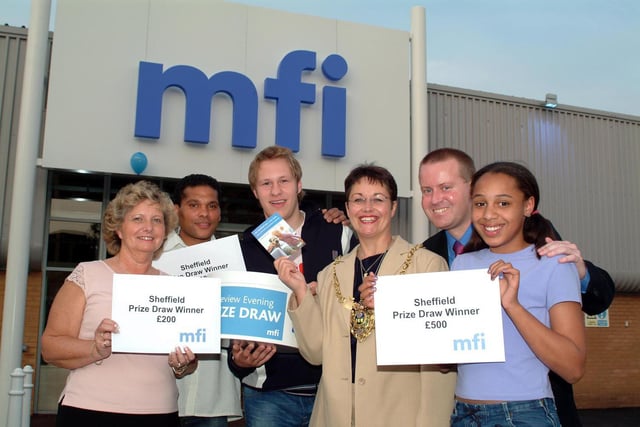 Furniture retailer MFI was one of the largest  suppliers of kitchens and bedroom furniture in the UK.  The business ceased trading in 2008 after going into administration.  Pictured here is the grand opening of the new MFI Store at St Mary's Gate, Sheffield.  After weeks of building, sales manager Rob Patrick and his team were joined by a Jamie Oliver look-alike of their very own and the Lord Mayor of Sheffield, Councillor Diane Leek, for an exclusive preview of the new store, May 30, 2003