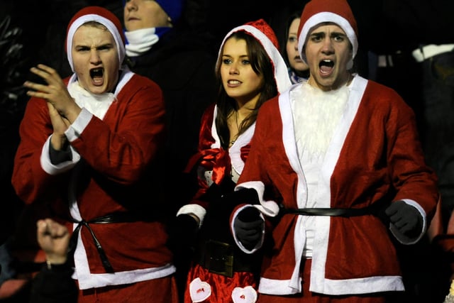 Owls fans get in the festive mood at Swindon Town in December 2010.