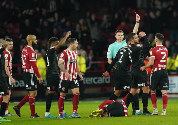 Referee Leigh Doughty shows a red card to West Bromwich Albion's Jake Livermore against Sheffield United: Mike Egerton/PA Wire.