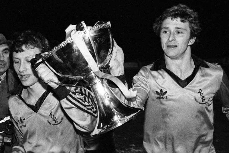 Paul Sturrock (left) and Dundee Utd Paul Hegarty celebrate with the trophy after defeating rivals Dundee on their own turf.
