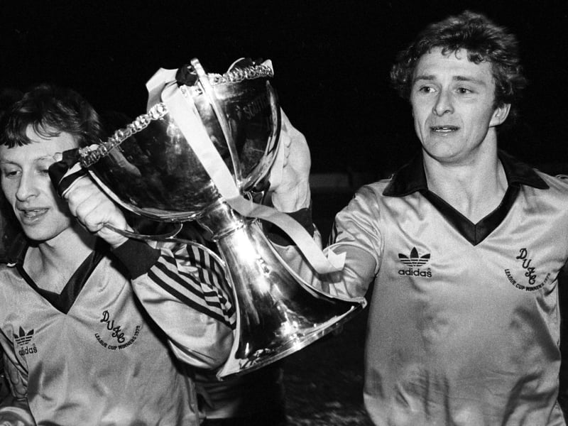 Paul Sturrock (left) and Dundee Utd Paul Hegarty celebrate with the trophy after defeating rivals Dundee on their own turf.