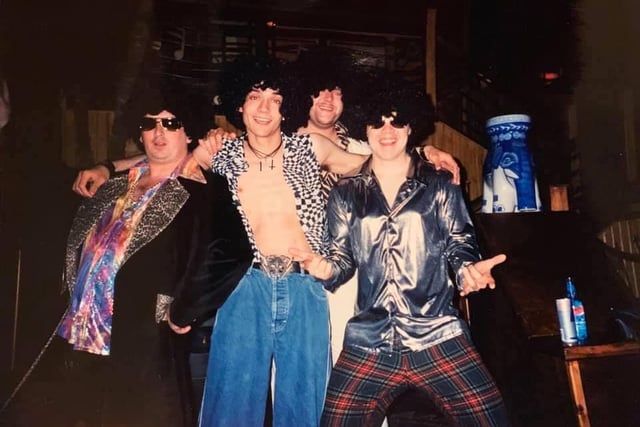These four blokes were snapped having a good time - but who are they?
