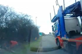 The moment driving instructor Steve Hewitt is forced to swerve off the road as a car transporter passes