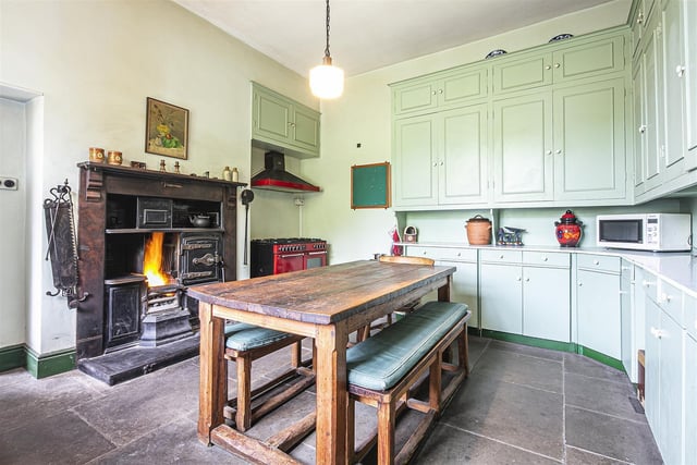 This breakfast kitchen is wonderfully finished and will go down brilliantly with fans of the Victorian style. The roaring fireplace next to the cooker is a unique touch.