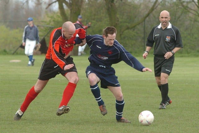 Pictured at the Pheonix Sports and Social Club, Brinsworth in 2005, where Hillsborough Pheonix ( in blue) played Packhorse Inn (in Red). Seen is Hillsborough's Lloyd Wilson in action against  Alex Gillott.