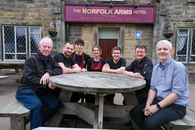 The Norfolk Arms at Ringinglow is Sheffield's highest pub, and it is said you can see the Humber Bridge from the site. PIctured are some of the staff