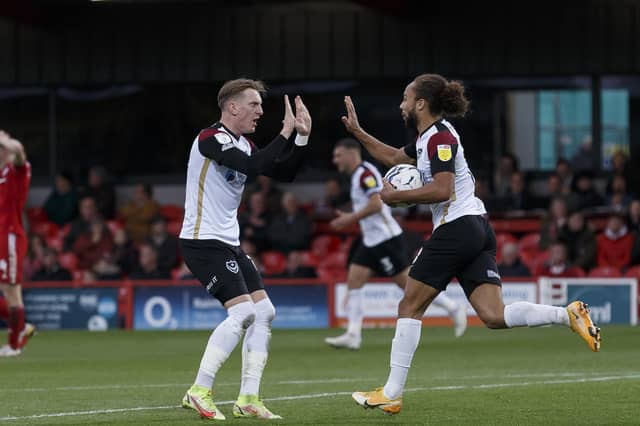 Marcus Harness celebrates with Ronan Curtis after netting Pompey's late leveller at Accrington. Picture: Daniel Chesterton/phcimages.com