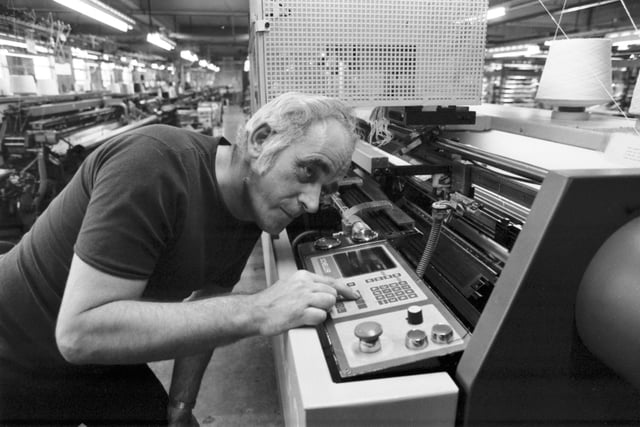 A worker using a Scheller bar filling machine at the Pringle knitwear factory in Hawick, December 1985.