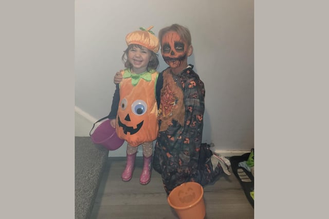 Amari and Riley look like they had a great Halloween as matching pumpkins!