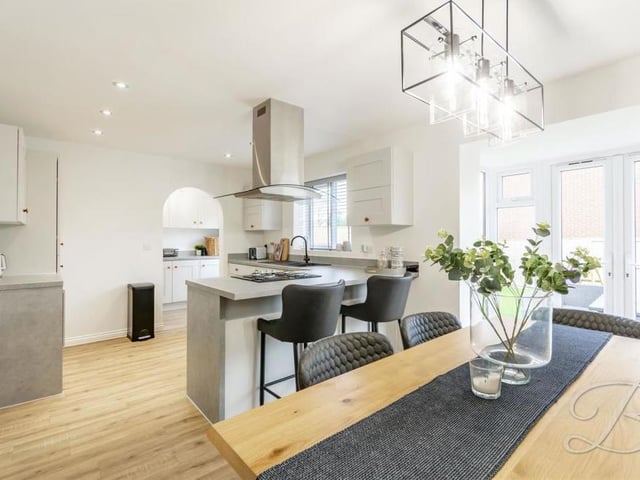 Take a look at the kitchen/diner again. Patio doors give access to the garden.