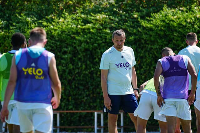 Slavisa Jokanovic speaks to his players on their pre-season camp in Malaga