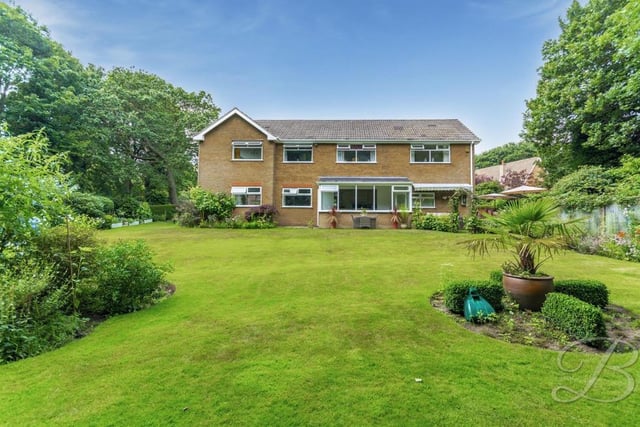 Step back and admire the well-maintained garden at the back of the house. Landscaped, it offers a great degree of privacy and is generously sized.