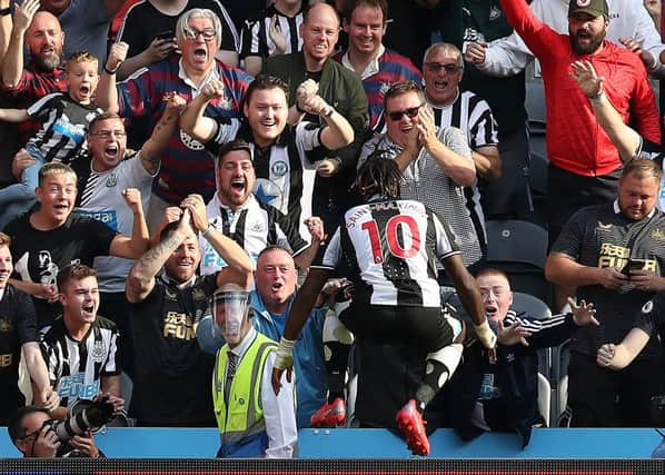 Allan Saint-Maximin celebrating his goal for Newcastle United against Southampton - but where does the strike rank in our list? (Photo by Ian MacNicol/Getty Images)
