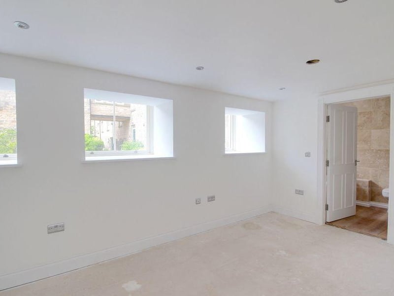 Down to the lower level of the property, and we find the master bedroom. Spacious is the best word to describe it.