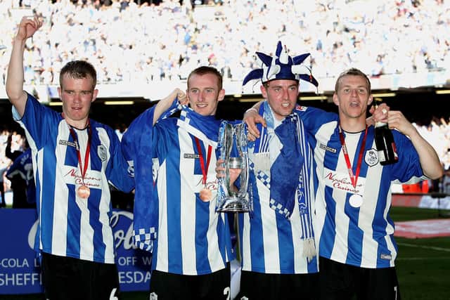 Sheffield Wednesday's Glen Whelan, Drew Talbot, Steven MacLean and Jon-Paul McGovern celebrate after the Owls' League One play-off final win over Hartlepool United at the Millennium Stadium in 2005.  (Photo by Stu Forster/Getty Images)