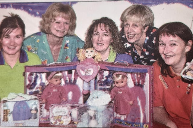 A Christmas donation from Asda to the Victoria Hospital, Kirkcaldy - (from left) Norma Ramsay (Asda),  Morag Kay (enrolled nurse), Diane Kerr (Asda), Gwen Simpson (nursing auxiliary), Paula Allan (Asda)