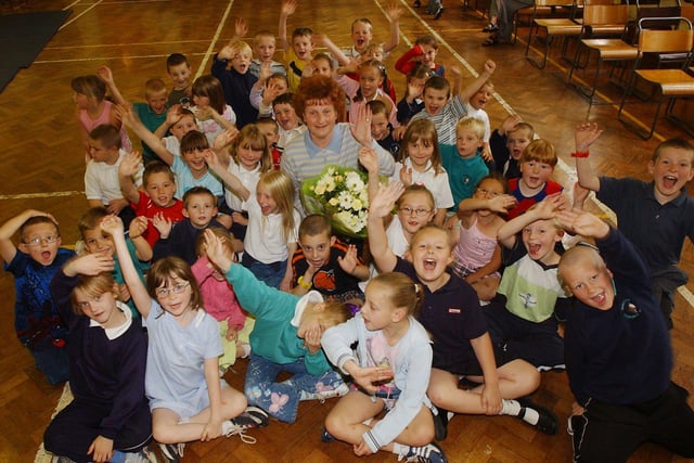 Dinner Lady Merle Aubrey is given a big send off after 28 years at Woodthorpe Primary School in 2004