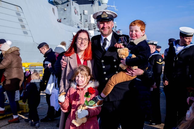 Steph Leonard with husband Lt Cdr Tom Leonard and their children Penny, seven, and Sebby, four, at HMS Diamond's homecoming. Picture: Habibur Rahman