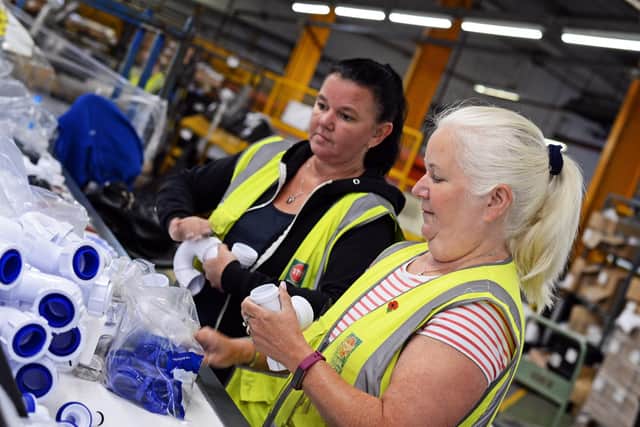 Workers on the undersink trap assembly line at Polypipe. Picture: Marie Caley