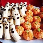 Offer healthy snacks like ‘Banana Ghosts’ or ‘Tangerine Pumpkins’