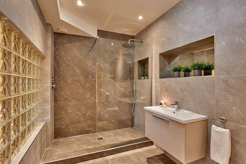 The modern ensuite has been renovated within the past three years.