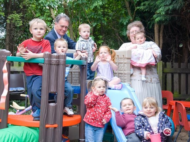 St Leger Homes of Doncaster gave the Evanston Gardens Toddler Group money to buy fencing, to make their toddlers’ play area safe and secure, and for additional toys.
Pictured in 2009 was John Young, Chairman of St Leger Homes, and Sue Wostenholm, of the toddler group, with some of the youngsters trying out the new play castle.
