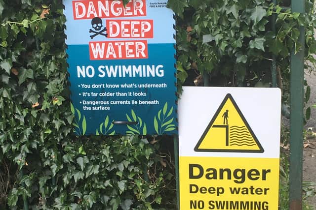 New signage shows highlights the danger of swimming in Crookes Valley lake.