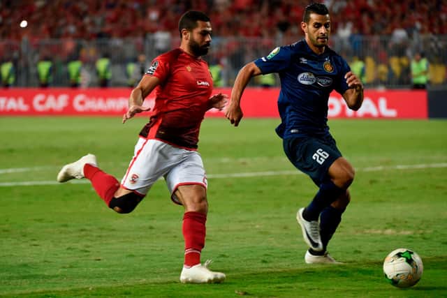 Ahly's defender Ahmed Fathy (L) vies for the ball with ES Tunis' defender Houcine Rabii (R) during the CAF Champions League final football match between Egypt's Al-Ahly and Tunisia's ES Tunis at the Borg el-Arab stadium near the Mediterranean city of Alexandria: KHALED DESOUKI/AFP via Getty Images