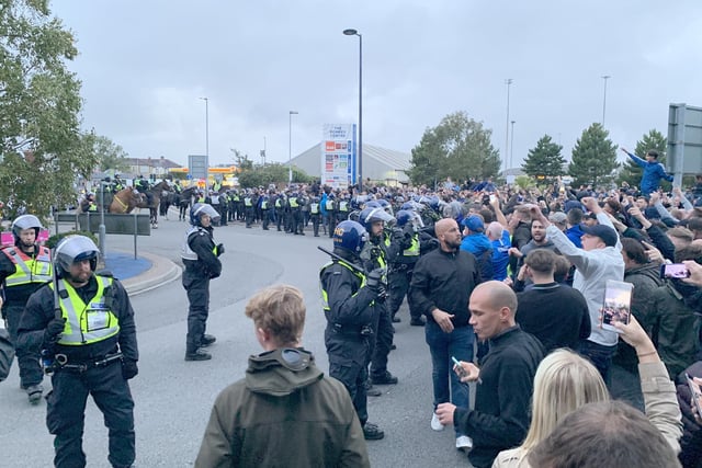 Police ran their 'biggest ever football operation' in Hampshire on September 24 as Pompey played Southampton at Fratton Park for the third round of the Carabao Cup.

Pictured is: Pompey fans in Goldsmith Avenue near the junction with Fratton Way.

Picture: Ben Fishwick (240919-9800)