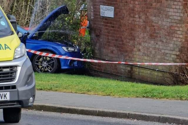 Pictured is a road traffic collision after a car appears to have crashed into the corner of a house on Hazlebarrow Road, at Jordanthorpe, Sheffield