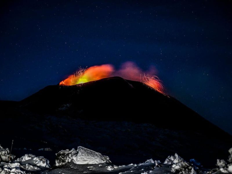 A night view of the Strombolian activity of the summit craters of the volcano Etna, photographed from an altitude of 2,900 metres, with explosions visible. (Photo by Fabrizio Villa/Getty Images)