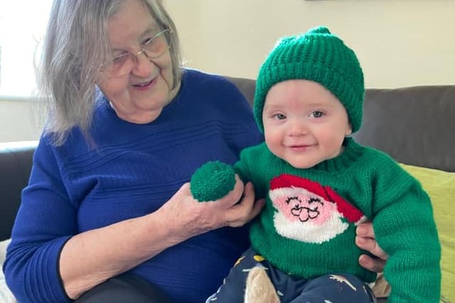 Joey-Thomas with Ella, who knitted his hat, mittens and Christmas jumper. He looks fantastic!