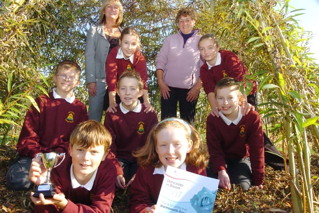 Children at Warmsworth Primary School celebrated after winning the Doncaster in Bloom Young Persons award in 2007. With Head Teacher Ann Marshall, and School Assistant Margaret Firth are L-R Daniel Phillips, Nathan Barker, Georgie Charlton, Jake Cooper, Katriona Millar, Megan Haggart, and Mitchell Keates, all ten.