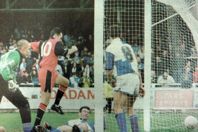 Guy Whittingham and Paul Walsh one-two their way through the Bristol Rovers defence before the goal machine applies the finish