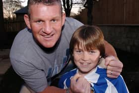 Dean Windass with his son Joshua, 11, who plays for Huddersfield Town's U12 Academy side.  Bradford City play Huddersfield Town this weekend.  November 17, 2005.