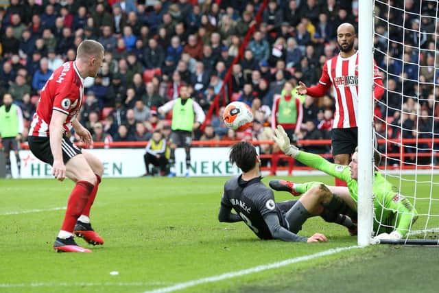 Dean Henderson of Sheffield United saves a shot from Mario Vrancic of Norwich City (Photo by Nigel Roddis/Getty Images)