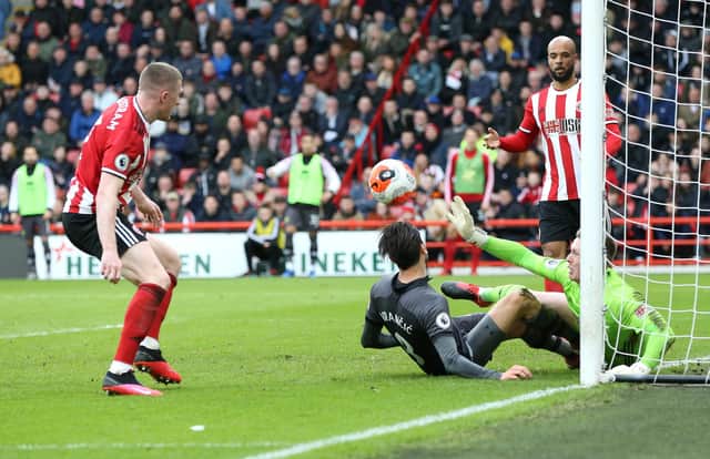 Dean Henderson of Sheffield United saves a shot from Mario Vrancic of Norwich City (Photo by Nigel Roddis/Getty Images)