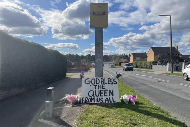 Tributes left to Queen Elizabeth at Highgate lane