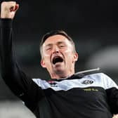 Sheffield United manager Paul Heckingbottom celebrates with supporters after victory over Swansea City: David Davies/PA Wire.