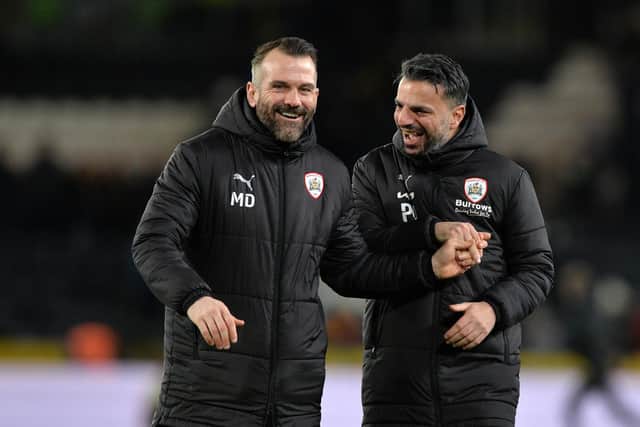 Martin Devaney celebrates Barnsley's win over Hull City earlier this season with former head coach Poya Asbaghi.