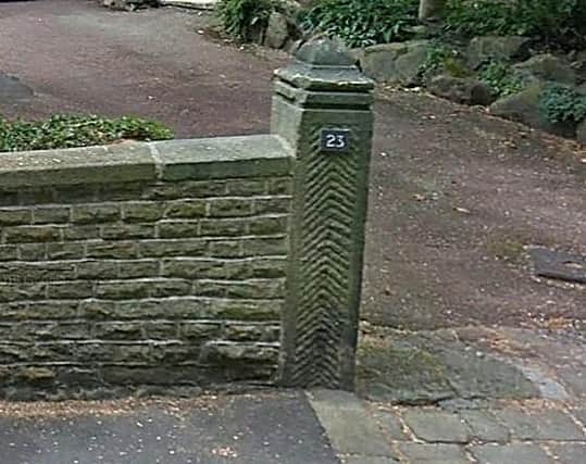 The gatepost to the property